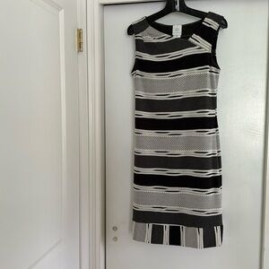 Papillonblanc dress; just below the knee;